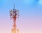 Abstract telecommunication tower Antenna and satellite at sunset sky background