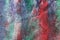 Abstract textural background with red, green and blue paint lines branches with white divorces, furrows, inflows, coasts