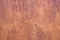 Abstract texture of brown wooden surface tinted