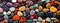 Abstract texture of colorful polished pebbles stones V1