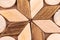 Abstract texture of a star made of wood and wood saw cut macro close-up background