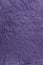 Abstract textured background. Violet background. Texture of crumpled purple paper.