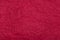 Abstract textured paper deep red ruby color background.