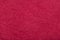 Abstract textured paper deep red ruby color background.