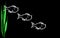 Abstract of three fish swimming isolated on a black background