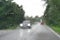 Abstract traffic in raining day. View from car