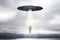 Abstract UFO with light taking businessman on sky background with mock up place. Spaceship and mystery concept