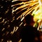 Abstract unrecognizable silhouette of boy back to us, who watches the show Fireworks. Explosive pyrotechnic devices for
