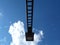 Abstract view of modern square head street lamp with blue sky