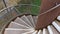 Abstract view of an outdoor spiral staircase looking down