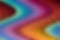 Abstract view of smooth blurry curls of rainbow color