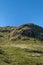 Abstract View Up a Rugged Highland Hillside with Cloudless Blue Sky Above