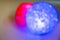 abstract vision of defocused two blurring circles red and blue