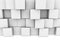 Abstract wall of white toy cubes