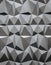 Abstract wallpaper or geometrical background consisting of black and white geometric shapes: triangles and polygons