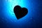 Abstract water drop background blue light spot heart silhouette
