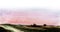 Abstract watercolor background. Blurry field with rural road against gentle sunrise sky of pastel shades. Soft gradient