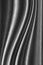 Abstract wavy fabric texture surface, curtain wave pattern background, macro texture of gray striped fabric