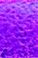 Abstract wavy surface with neon magenta and violet hues.