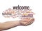 Abstract welcome or greeting international word cloud in hand, different languages or multilingual