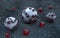 Abstract white concrete sphere with red glass bubbles 3d rendering. Alien object on the ground