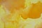 Abstract yellow and orange watercolour background