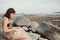 Abstract Young woman in casual style fashion lying on the beach