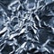 Abstract zoom tunnel of crumpled silver aluminum foil closeup background texture, pattern in blue
