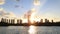 Abu Dhabi cityscape, Al Reem island at sunset, buildings silhouettes against sky