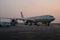 Abu Dhabi . November 2012. Early morning. A plane has just arrived on the platform. Technical staff, serves the aircraft