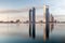 Abu Dhabi skyline at sunrise. Establishing shot.