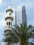 Abu Dhabi skyline: tower block and minaret