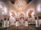 Abu Dhabi, UAE - 11.03.2017: Awe inspiring interior of in the Sheikh Zayed Grand Mosque. Crystal chandelier and richly