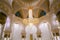 Abu Dhabi, UAE - 11.03.2017: Awe inspiring interior of in the Sheikh Zayed Grand Mosque. Crystal chandelier and richly