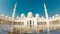 Abu dhabi, UAE - 3rd october, 2022: Grand Mosque in Abu Dhabi mid day in hot weather. Wide low angle panorama of exterior of