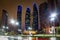 Abu Dhabi, UAE - March 26, 2014: Etihad Towers illuminated at night in Abu Dhabi, UAE. Five towers complex with 74 floors is the