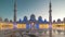 ABU DHABI, UAE - MAY 2017: Sunset timelapse in Sheikh Zayed Mosque in Abu Dhabi, United Arab Emirates. Transition of the