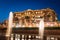 Abu Dhabi, United Arab Emirates - November 1, 2019: Emirates palace in Abu dhabi reflected on the ground level fountain