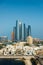 Abu Dhabi, United Arab Emirates - September 19, 2019: Abu Dhabi skyline view of the downtown buildings rising over the water