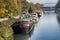 Abundance of moored houseboats residential barges