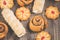 abundance of pastries on a dark wooden background/abundance of pastries on a dark wooden background. Top view