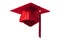 Academic achievement and celebrating higher education success conceptual idea with red mortarboard graduation cap with clipping