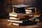 Academic success, graduation cap on books, wooden desk background