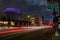 Academy Museum's Sphere building and the Petersen Automotive Museum illuminated at night