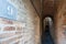 access corridor to housing buildings in the archaeological park of Pompeii, Italy.