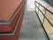 Access ramp to the building for the disabled with handrails. External Disabled Accessible Ramp For Wheelchair Use. Adaptation of