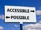 Accessible or possible symbol. Concept word Accessible or Possible on beautiful billboard with two arrows. Beautiful blue sky