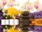 Accessories for spa with orchids, lavender, stones, candles and