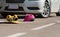 Accident skateboard crashes car after stunt on street.