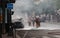 Accident in the streets of Paris . Some Firemen extinguishing the fire of the car